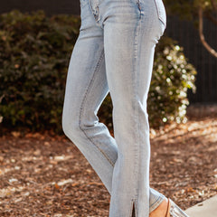 Classic light blue straight-leg women's jeans, offering comfortable & effortless everyday wear.