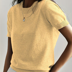 Effortless style: Women's elegant short sleeve knit sweater in a neutral hue.