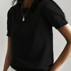 Premium women's short sleeve knit sweater, combining elegance with everyday comfort.