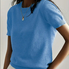 Versatile women's short sleeve top, a comfortable knit sweater for warm weather.