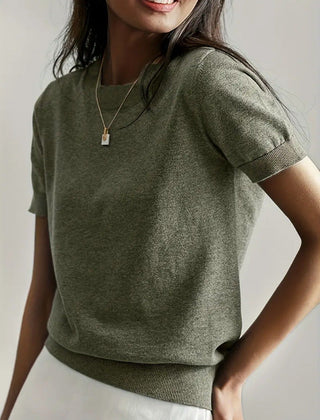 Breathable women's short sleeve knit sweater, perfect for summer comfort and style.