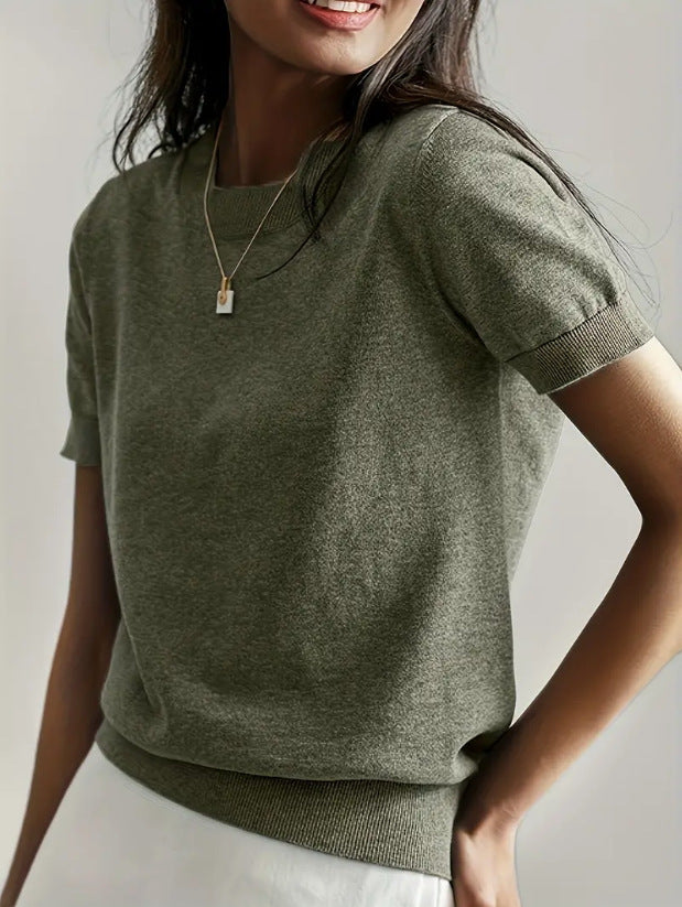 Breathable women's short sleeve knit sweater, perfect for summer comfort and style.