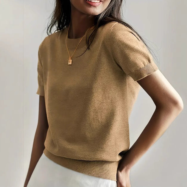 Stylish women's short sleeve sweater, a soft knit top for a relaxed yet elegant look.